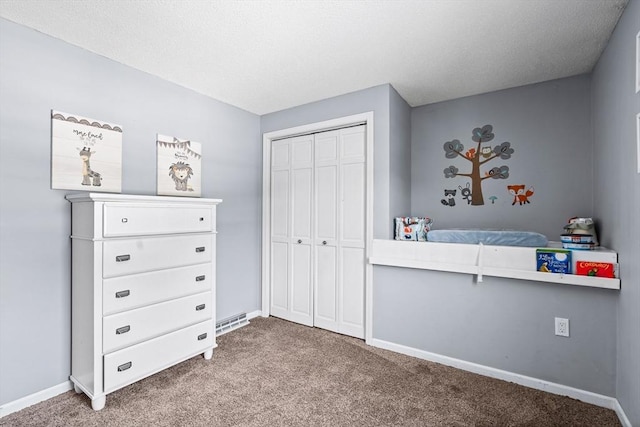 unfurnished bedroom featuring a closet and carpet