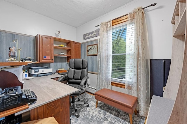 office featuring a baseboard radiator and crown molding