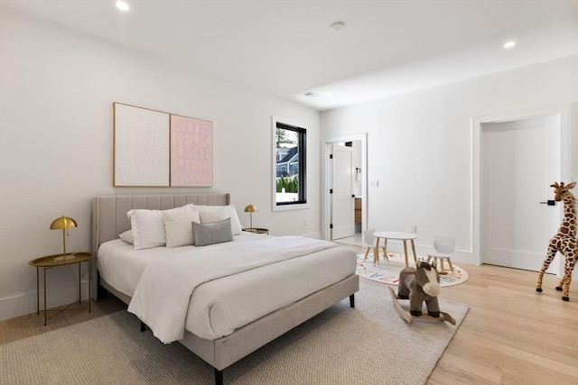 936 Central Ave, Needham, MA 02492 - bedroom featuring light wood finished floors, recessed lighting, and baseboards