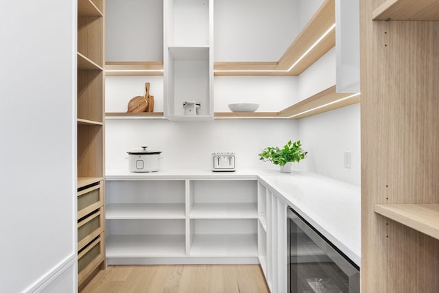 pantry featuring wine cooler