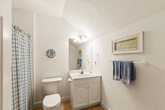 bathroom featuring curtained shower, vanity, toilet, and vaulted ceiling