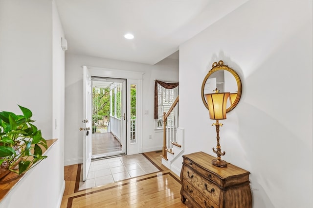 entrance foyer with light wood-type flooring