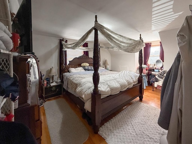 bedroom featuring wood finished floors