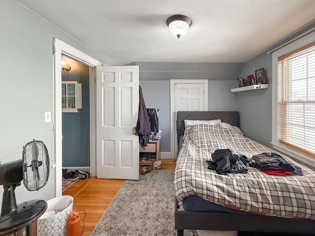 bedroom featuring light wood finished floors