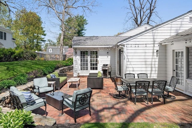 view of patio featuring an outdoor living space, grilling area, and outdoor dining space