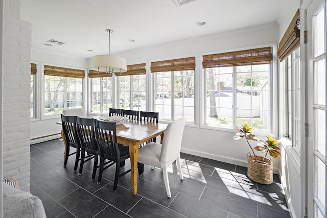 sunroom / solarium featuring tile patterned flooring, a baseboard heating unit, ornamental molding, baseboards, and recessed lighting