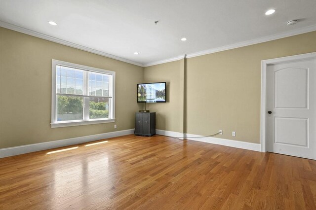 75 Pine St Unit 21, Waltham, MA 02453 - empty room featuring ornamental molding, baseboards, recessed lighting, light wood-style flooring, and a smoke detector