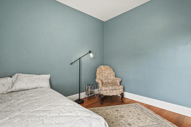 75 Pine St Unit 21, Waltham, MA 02453 - bedroom featuring wood finished floors and baseboards