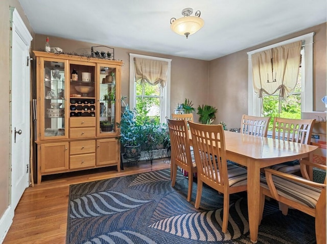 dining room with light wood-type flooring