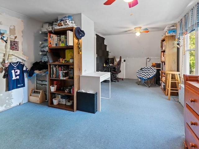 misc room featuring ceiling fan and carpet