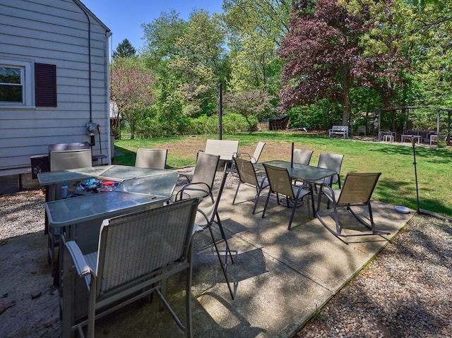 view of patio featuring outdoor dining space