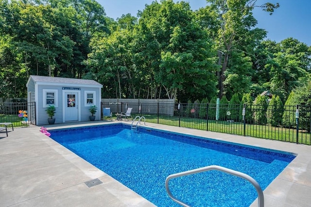 46 Pine, Falmouth, MA 02556 - view of pool featuring an outbuilding, a patio, an exterior structure, and view of scattered trees
