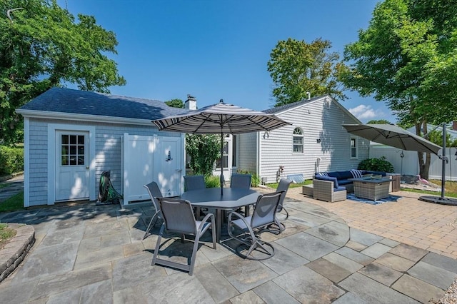 46 Pine, Falmouth, MA 02556 - view of patio / terrace featuring an outdoor hangout area, outdoor dining area, and an outdoor structure