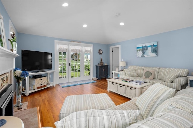 46 Pine, Falmouth, MA 02556 - living room with wood finished floors, a fireplace, recessed lighting, and lofted ceiling