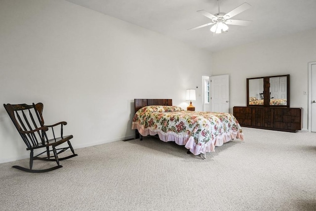 bedroom featuring carpet, baseboards, and a ceiling fan