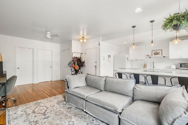 122 W 9th St Unit 2, Boston, MA 02127 - living room with wood finished floors, ceiling fan, and recessed lighting