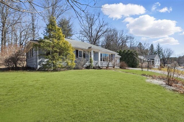 view of front of property with a front yard