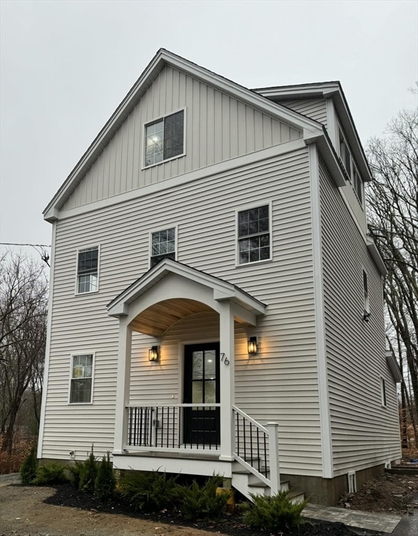 view of front of property featuring covered porch