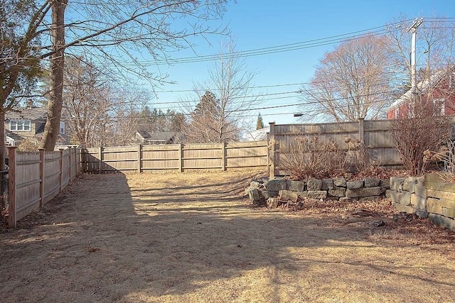 view of yard featuring a fenced backyard