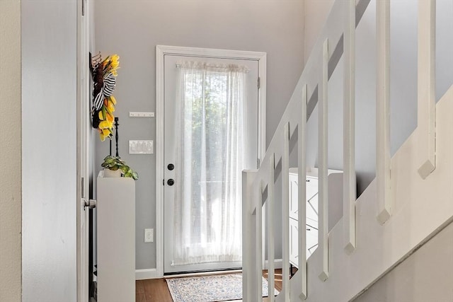 263 Meeting House Path Unit 263, Ashland, MA 01721 - entrance foyer featuring wood finished floors, stairway, and baseboards