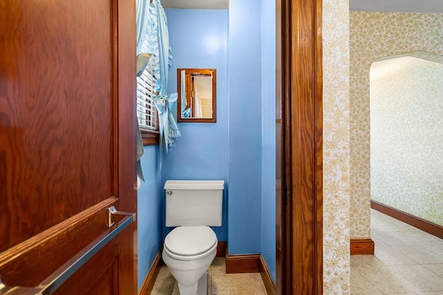 bathroom featuring toilet