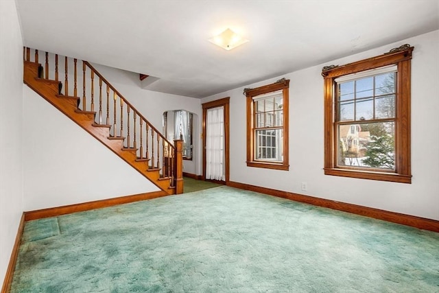 foyer with carpet floors