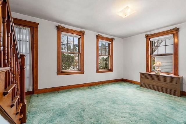 empty room featuring carpet flooring