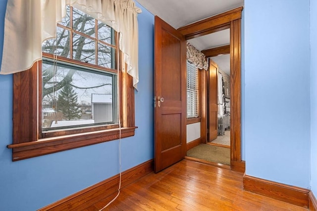 hallway featuring light hardwood / wood-style flooring