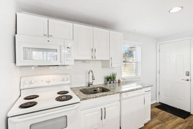 kitchen featuring white cabinetry, white appliances, sink, and dark wood-type flooring