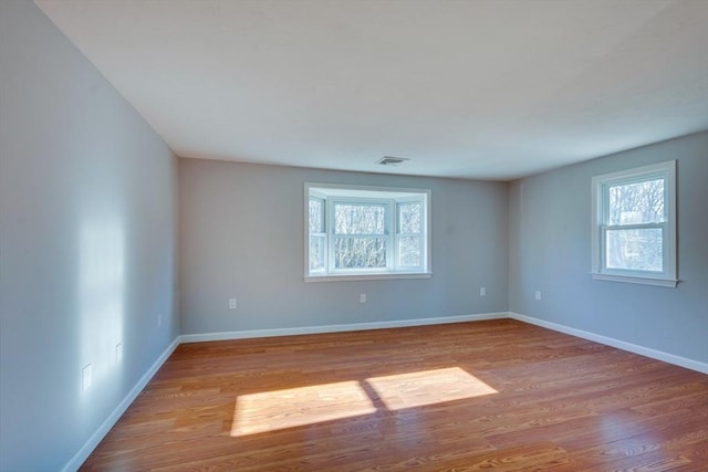 empty room with light wood-type flooring