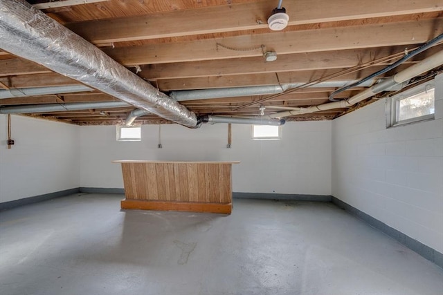 basement featuring plenty of natural light