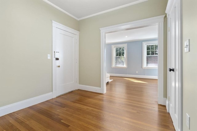132 Sewall St Unit C, Brookline, MA 02446 - entryway featuring wood finished floors, ornamental molding, and baseboards