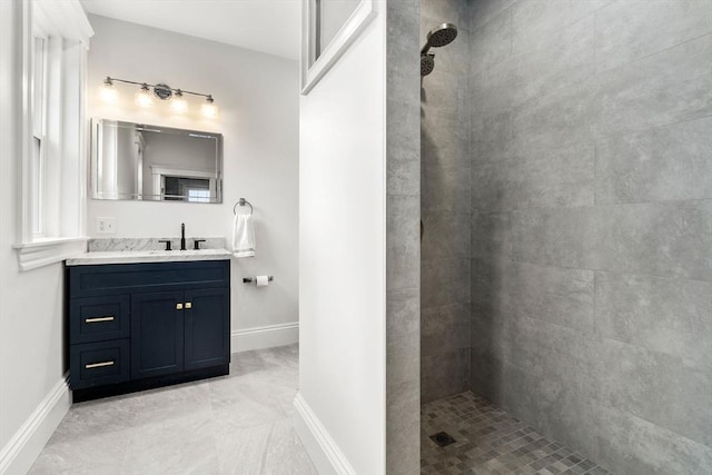 132 Sewall St Unit C, Brookline, MA 02446 - full bath with vanity, tiled shower, and baseboards