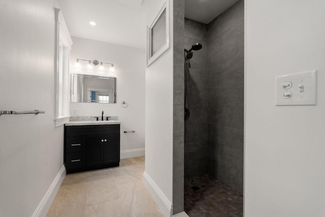 132 Sewall St Unit C, Brookline, MA 02446 - full bathroom with vanity, walk in shower, baseboards, and tile patterned floors