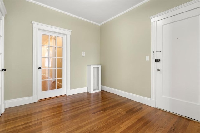 132 Sewall St Unit C, Brookline, MA 02446 - empty room featuring wood finished floors, crown molding, and baseboards