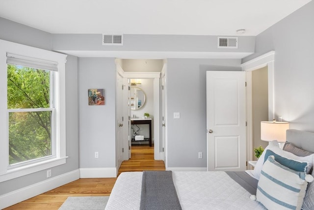 50 Alpine St Unit 2, Somerville, MA 02144 - bedroom with light wood-type flooring and baseboards