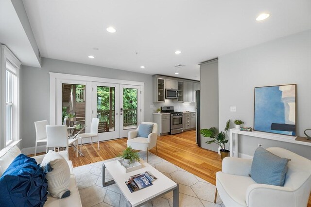 50 Alpine St Unit 2, Somerville, MA 02144 - living area featuring recessed lighting, light wood-style flooring, and french doors