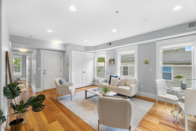50 Alpine St Unit 2, Somerville, MA 02144 - living room featuring light wood finished floors, healthy amount of natural light, baseboards, and recessed lighting