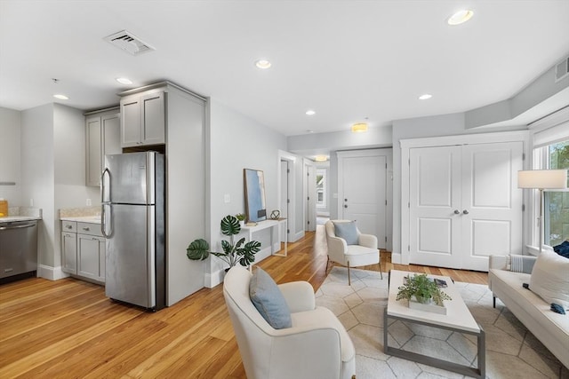 50 Alpine St Unit 2, Somerville, MA 02144 - living area with light wood-style floors, recessed lighting, and baseboards