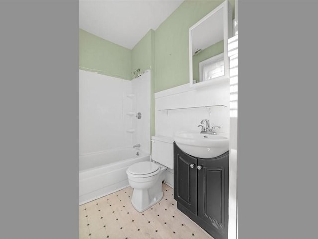 full bathroom featuring vanity, bathtub / shower combination, and toilet