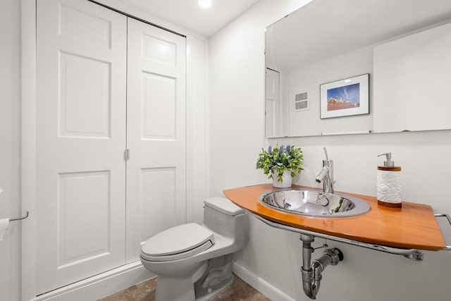 1010 Memorial Dr Unit 3F, Cambridge, MA 02138 - half bathroom with a sink and toilet