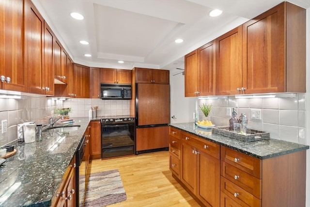 1010 Memorial Dr Unit 3F, Cambridge, MA 02138 - kitchen featuring paneled built in refrigerator, black microwave, electric stove, a sink, and recessed lighting
