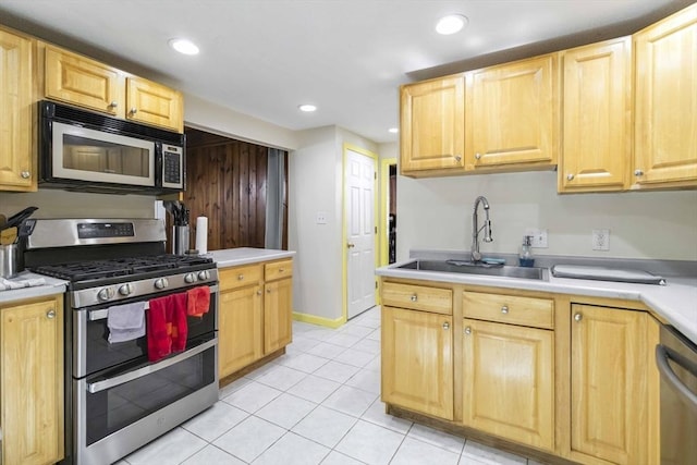 69 Powder Mill Rd, Maynard, MA 01754 - kitchen featuring appliances with stainless steel finishes, light brown cabinets, light countertops, recessed lighting, and light tile patterned flooring