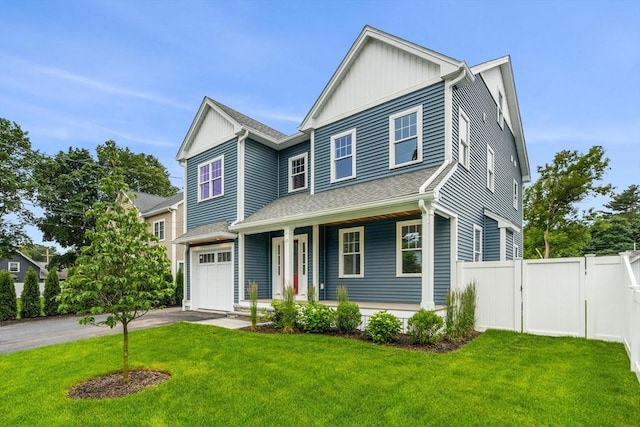 10 Whittier Rd, Natick, MA 01760 - view of front facade featuring covered porch, an attached garage, driveway, board and batten siding, and a gate