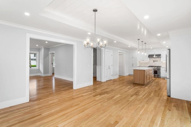 10 Whittier Rd, Natick, MA 01760 - kitchen featuring appliances with stainless steel finishes, under cabinet range hood, open floor plan, light countertops, and recessed lighting