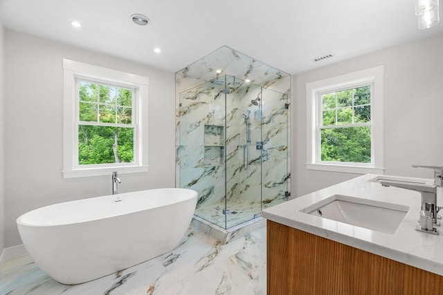 10 Whittier Rd, Natick, MA 01760 - full bathroom with plenty of natural light, a marble finish shower, a soaking tub, and recessed lighting
