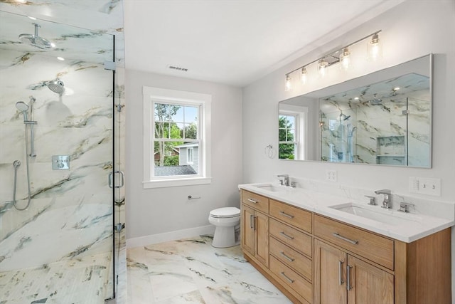 10 Whittier Rd, Natick, MA 01760 - bathroom featuring a marble finish shower, double vanity, and marble finish floors
