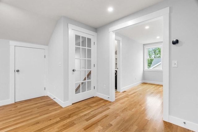 10 Whittier Rd, Natick, MA 01760 - additional living space with light wood-style flooring, recessed lighting, and lofted ceiling