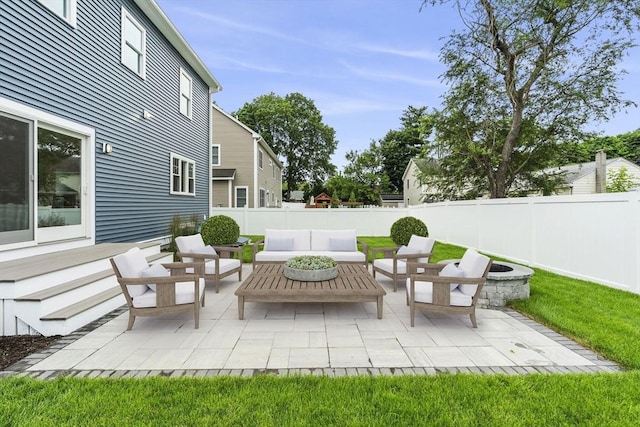 10 Whittier Rd, Natick, MA 01760 - fenced backyard with an outdoor hangout area and a patio
