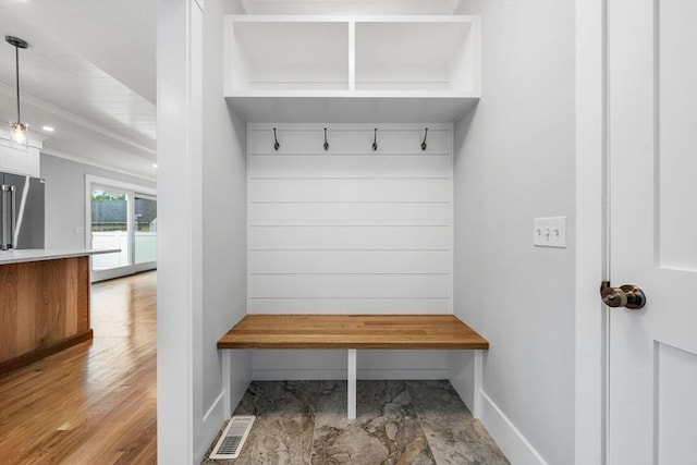 10 Whittier Rd, Natick, MA 01760 - mudroom with baseboards and light wood finished floors